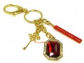 Key to Success Red Jewel Om Mani Keychain